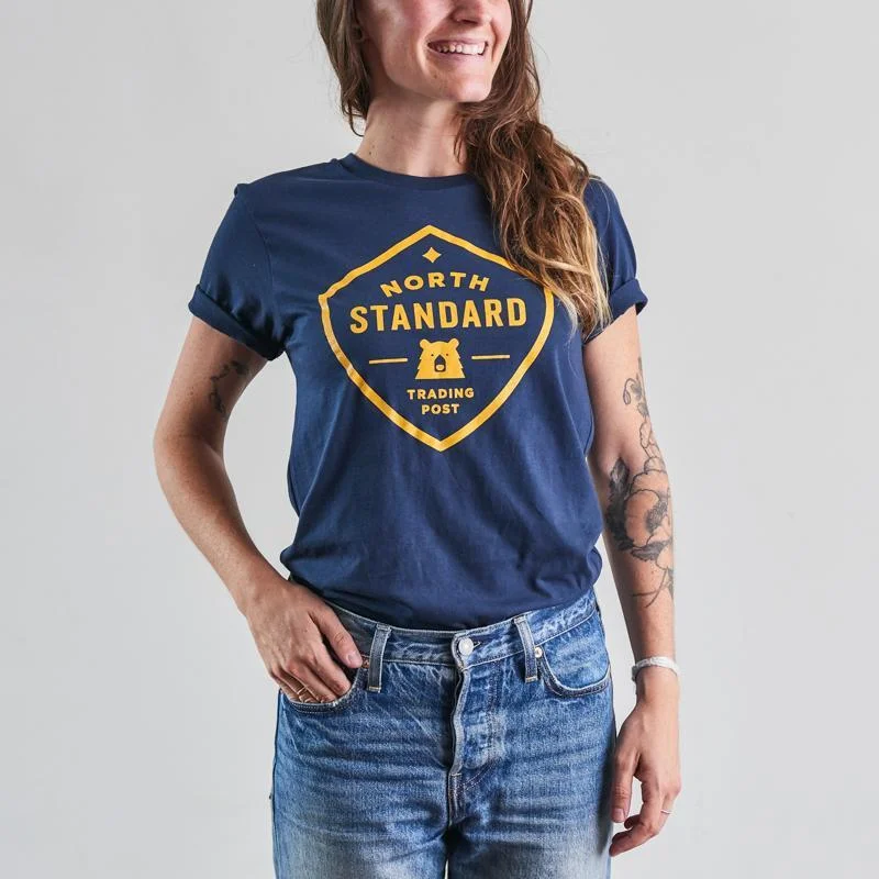 women's tops for those who want to wear versatile pieces that can be dressed up or downShield Tee (Navy + Golden Yellow)